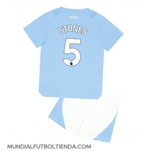 Camiseta Manchester City John Stones #5 Primera Equipación Replica 2023-24 para niños mangas cortas (+ Pantalones cortos)